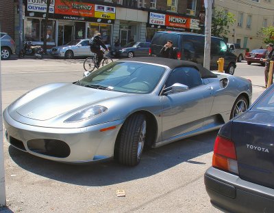 Ferrari outside Henry's Cameras, Queen St E.