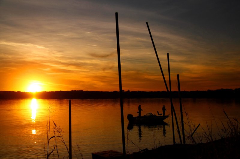 FISHING AT SUNSET
