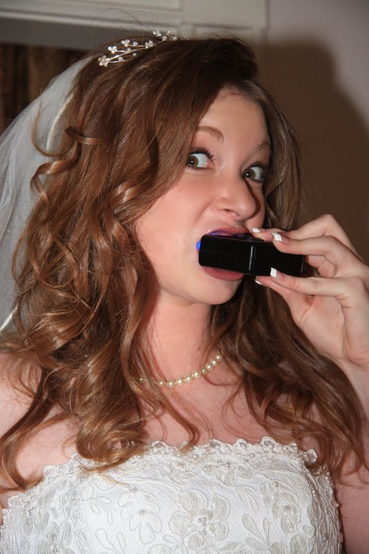 WHITENING HER TEETH