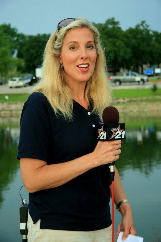 Beth Wagner.....News Woman ready to do a story for the News tonight