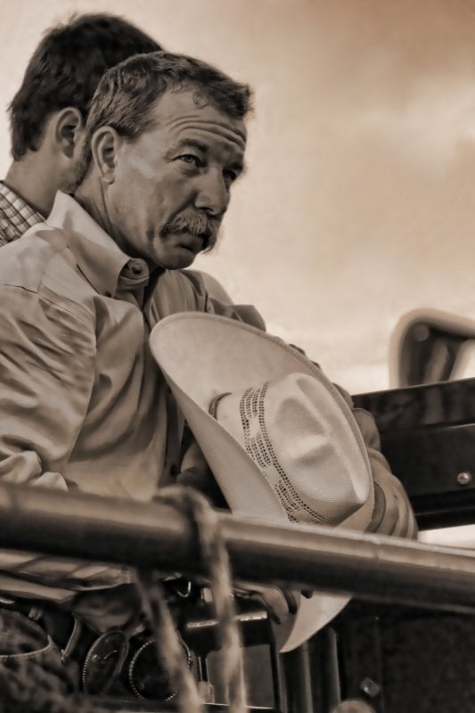 REMOVING HIS HAT FOR THE NATIONAL ANTHEM