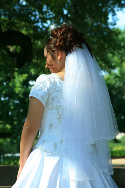 FROM BEHIND