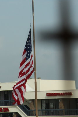 RED, WHITE AND BLUE AND THE IMAGE OF A CROSS