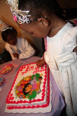 CHECKING OUT HER CAKE AND TAKING A NIBBLE