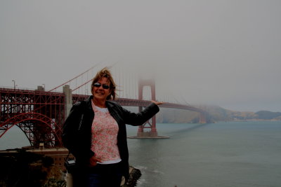 HOLDING UP THE BRIDGE AS THE FOG IS HEAVY