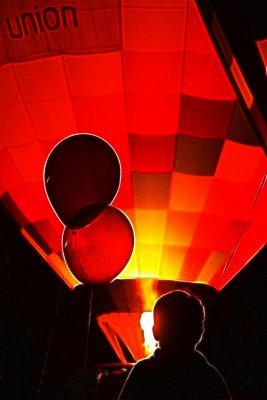 SMALL BOY AND BALLOONS