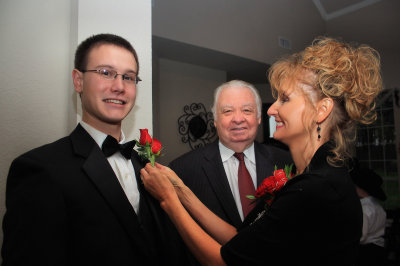 MOM PINS ON THE BOUTONNIERE