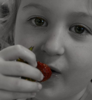 EATING A STRAWBERRY