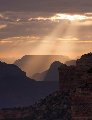 Suns rays paint the canyon with golden 