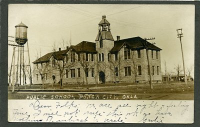 OK Ponca City Public School and water tower ca 1907 or earlier.jpg