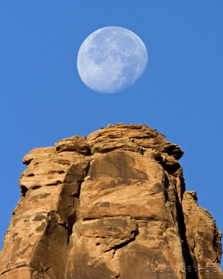 Moon over red rock