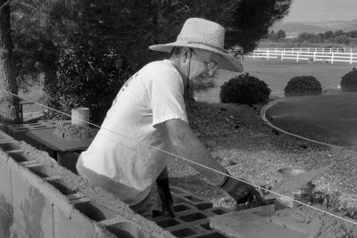 Laying mortar for fence
