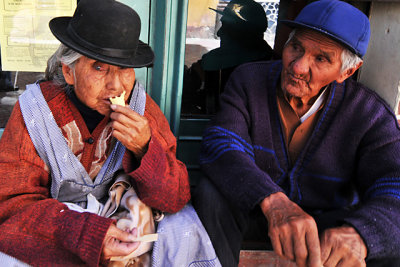 Old couple enjoying ice cream on the streets of Potosi