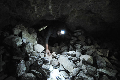 Crawling through some of the mines passage ways. The sharp rocks are hard on the knees.