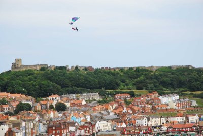 Sky divers coming in to land on Scarborough beach on Armed Forces Day