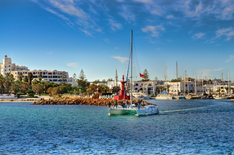 Catamaran leaving Port El Kantaoui Marina