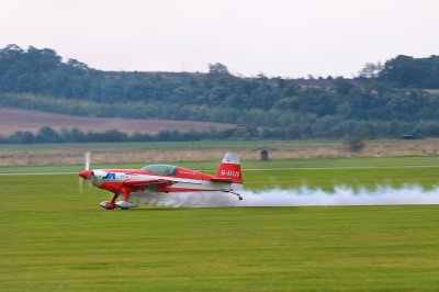 Extra 300S landing - smoke on