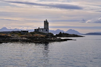 Lighthouse near Plockton with the Isle of Skye in the background