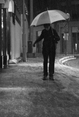 Guy with brolly wobbling.jpg