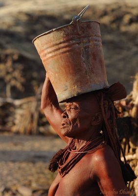 Himba Lady at work