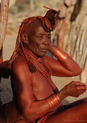 Himba lady at make up