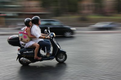 Scooters and small cars all over town