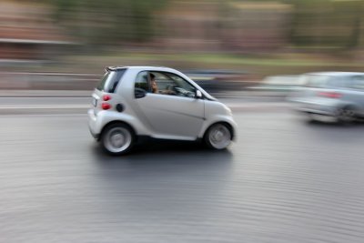 Scooters and small cars all over town