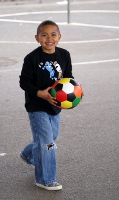 a smiling soccer star