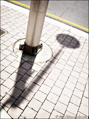 Pole and shadow