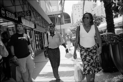 Man with white plastic bag