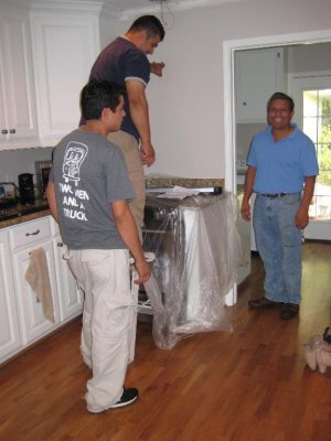 Jorge and the guys installing the new vent hood