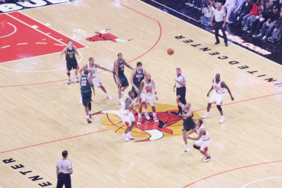 The tip-off. Bulls ball