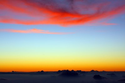 The red fire clouds float away, Haleakala National Park, Maui, Hawaii, USA