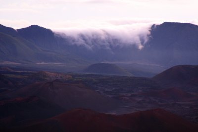 Clouds flowing over the peaks, Haleakala National Park, Maui, Hawaii, USA