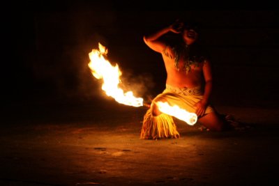 Samoan fire dancer loves the crowd, Polynesian village, Oahu, Hawaii, USA