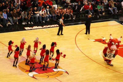 Lil Benny skates as the Luvabulls dance