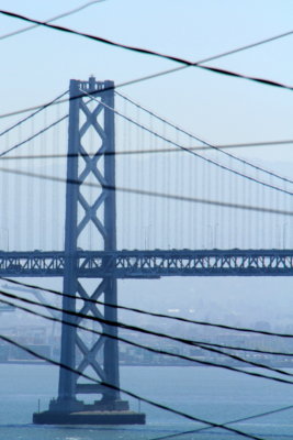 Bay Bridge, cable car and electric wires, San Francisco