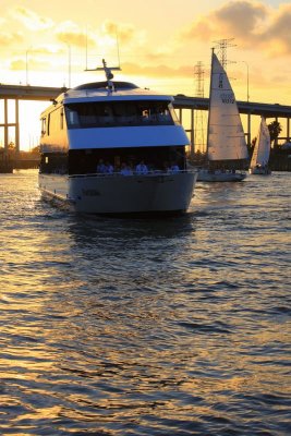 As the sun sets in Kemah, a boat comes by