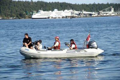 Support boat gives chase