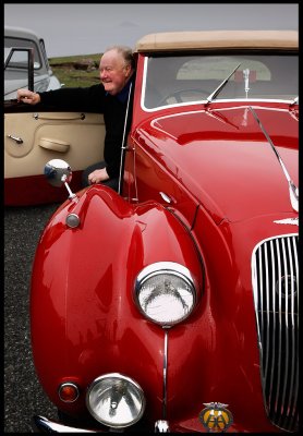 Proud Lagonda owner at Stenness lighthouse