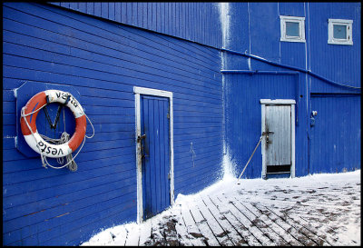 Blue house at the fish-oil factory in Vads
