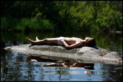 First really hot summerday - Martin sunbathing in lake Toftasjn