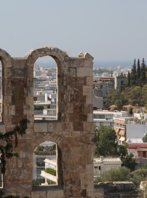 View of modern Athens through the arches of Theatre of Dionysus