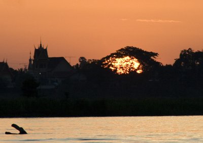 Sunset taken while having spicy thai salad in a beautiful restaurant floating in the river