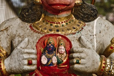 Hanuman rips open his sternum.