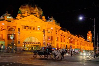 Flinders Street at Night
The station and an open horse-drawn coach 