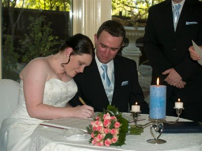 Signing the papers