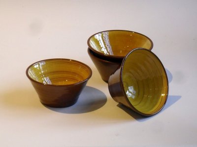 Four Yellow Iron Oxide Bowls