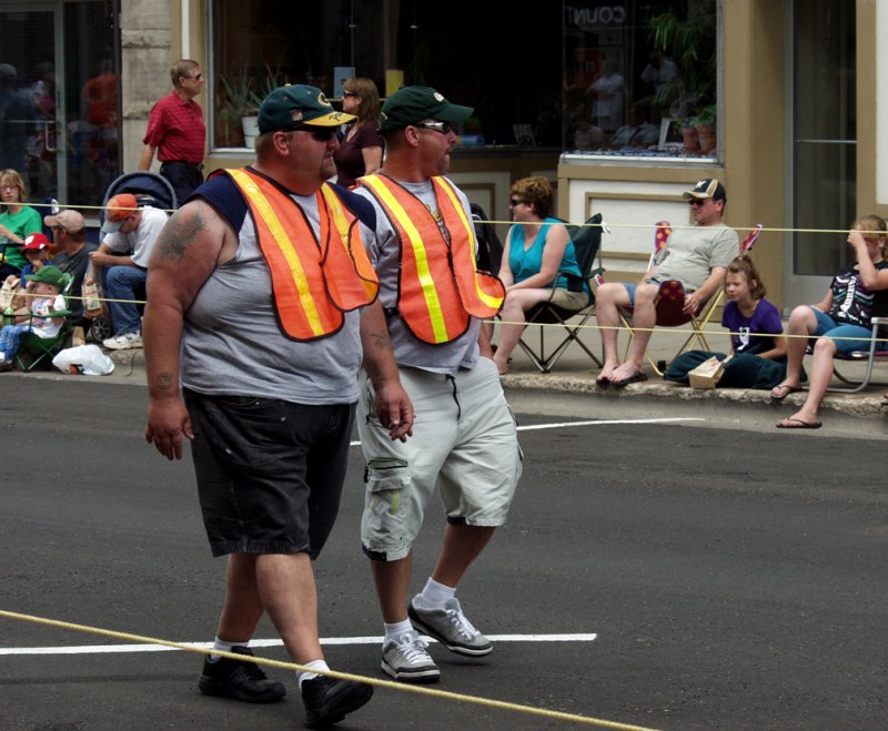 All You Really Need For A Parade Is A Couple Guys In Reflective Vests....