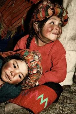 sister's leaning on father's leg-nightfall, Peru